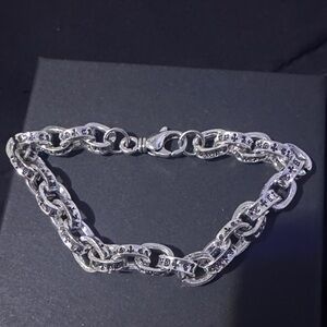 Luxury 925 silver cross bracelet 
about 8in

CH bracelet